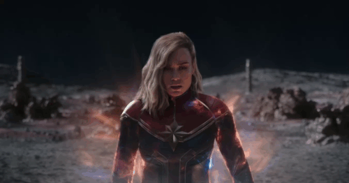 The Marvels - Carol Captain Marvel launching into space with ginger tabby cat Goose Flerken on shoulder animated gif