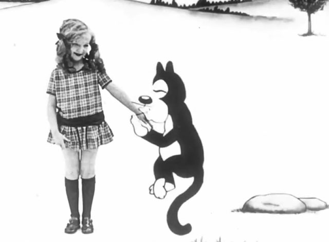 Alice's Spooky Adventure - cartoon black cat kissing hand of Alice Virginia Davis