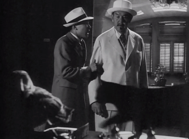 Charlie Chan in Panama - black cat crossing desk in front of Charlie Chan Sidney Toler and Jimmy Sen Yung