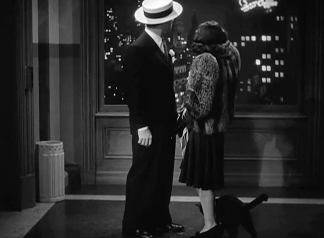 Christmas in July - black cat Hamlet in hallway with Jimmy Dick Powell and Betty Ellen Drew