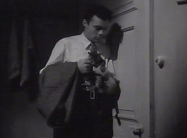 Desperate Moment - Simon Dirk Bogarde holding tiny tabby kitten in dark kitchen