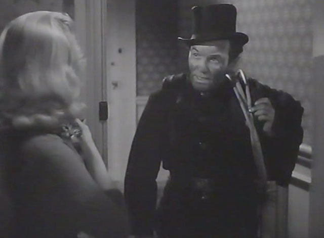 Desperate Moment - Anna Mai Zetterling holding tiny tabby kitten at door with chimney sweep