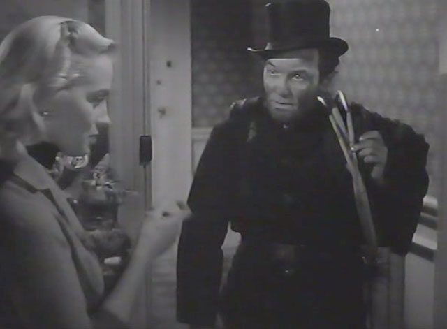 Desperate Moment - Anna Mai Zetterling holding tiny tabby kitten at door with chimney sweep