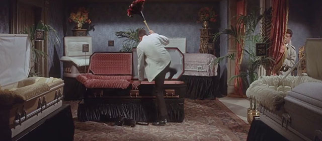 Dr. Goldfoot and the Bikini Machine - black cat Rasputin sitting in front with Igor Jack Mullaney entering coffin and Craig Gamble Frankie Avalon hiding