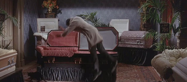 Dr. Goldfoot and the Bikini Machine - black cat Rasputin running away from coffin as Craig Gamble Frankie Avalon flies into coffin