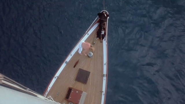 Eureka - overhead shot of boat deck with reddish cat running across