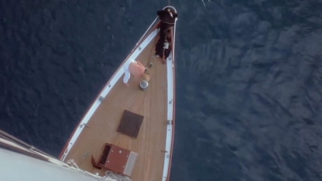 Eureka - overhead shot of boat deck with reddish cat running across