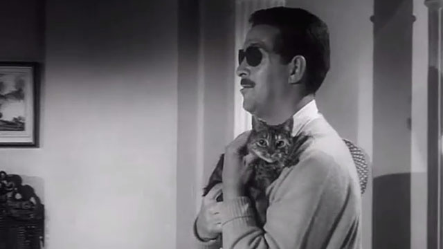 Faces in the Dark - Hammond John Gregson holding Manx tabby cat