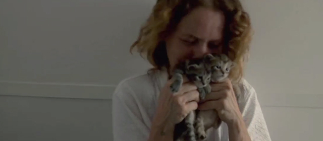 Francine - Francine Melissa Leo clutching tabby kittens