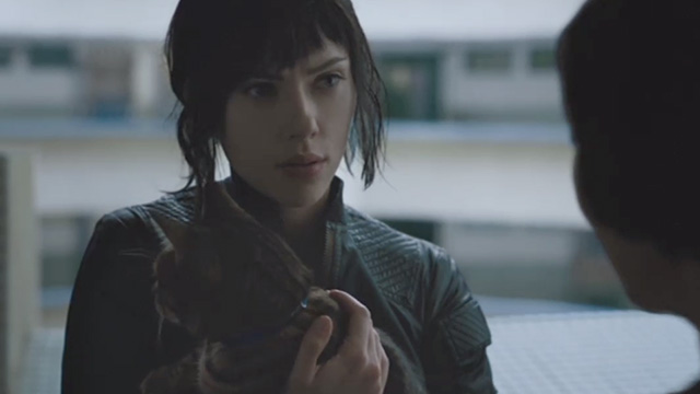 Ghost in the Shell - Major Scarlett Johansson holding tabby cat Pumpkin outside apartment