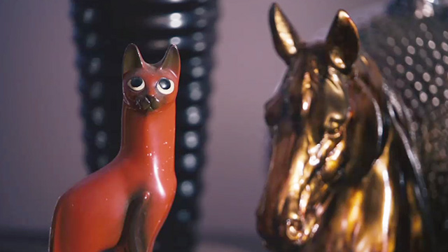 The Grand Seduction - cat and horse figurines