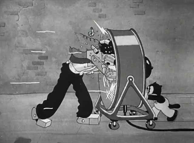 Hollywood Capers - Looney Tunes cartoon black cat Beans using large fan to chop up Frankenstein's monster