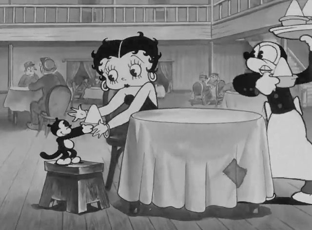 I Heard - black kitten standing on stool as Betty Boop hands over ice cream from waiter