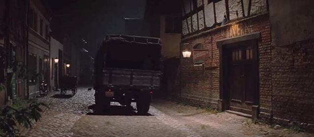 Inglourious Basterds - black cat running across street as truck approaches