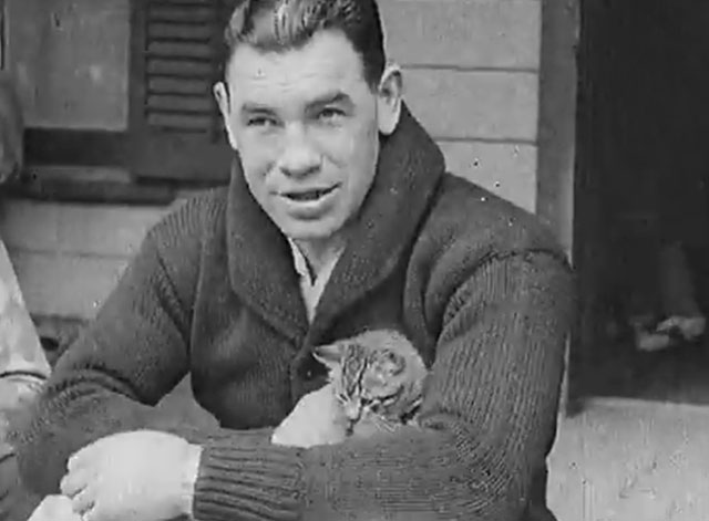 Isn't He Like Dempsey? - Max Scheling sitting with tabby kitten on lap