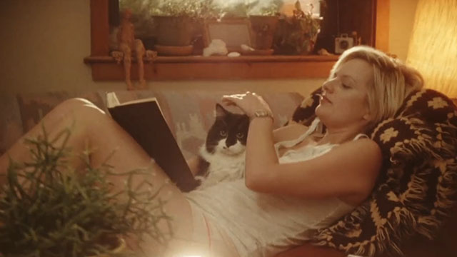 Listen Up Philip - Ashley Elisabeth Moss with longhair tuxedo cat Gadzookey Fluffy