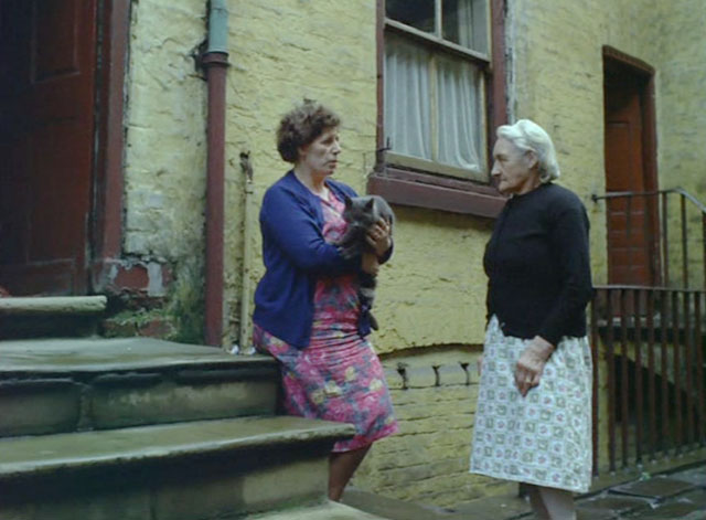 Look at Life - No Place Like Home - two women talking outside home one holding gray cat