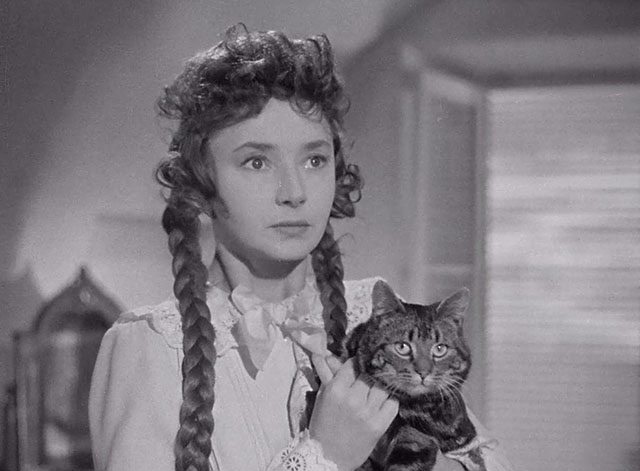 A Man About the House - Ellen Dulcie Grey holding tabby cat Waify