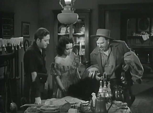 The Man From Dakota - black cat on table with Barstow Wallace Beery Clark John Howard and Eugenia Dolores Del Rio