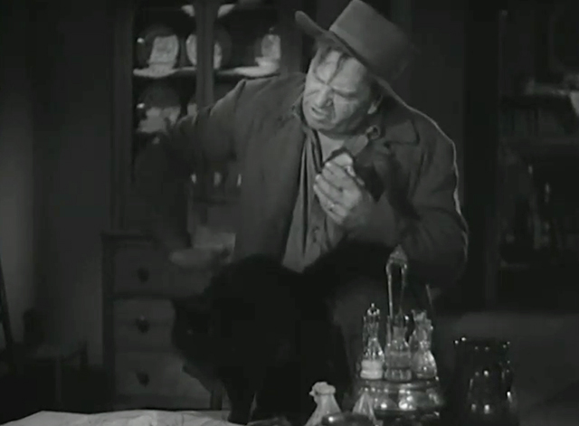 The Man From Dakota - black cat on table with Barstow Wallace Beery