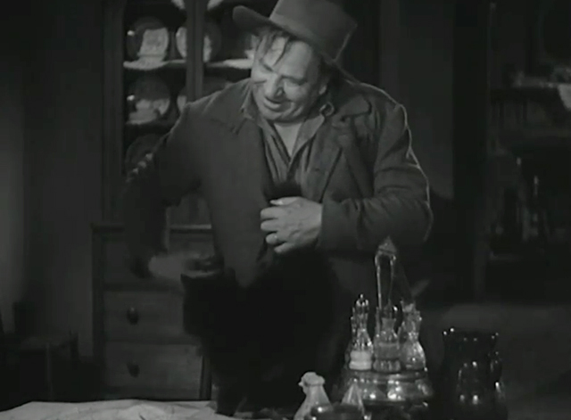 The Man From Dakota - black cat on table with Barstow Wallace Beery