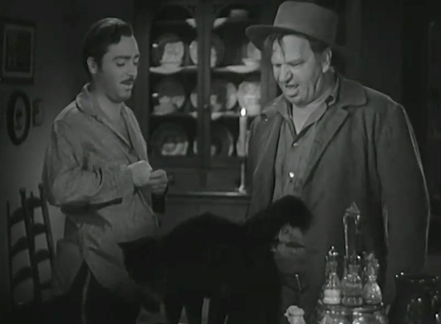 The Man From Dakota - black cat on table with Barstow Wallace Beery and Clark John Howard