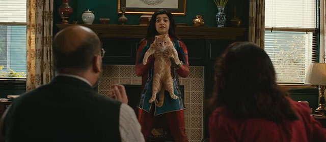 The Marvels - ginger tabby cat Flerken Goose with Kamala Iman Vellani in house