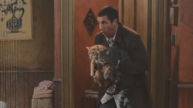 Mr. Deeds - Deeds Adam Sandler holding two tabby cats