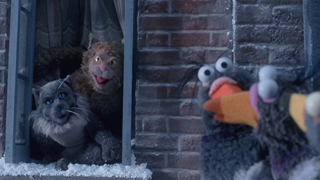 The Muppet Christmas Carol - Muppet cats in window looking at pigeons