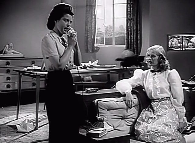 Penny and the Pownall Case - Penny Peggy Evans on phone with tuxedo cat on table behind with Molly Diana Dors