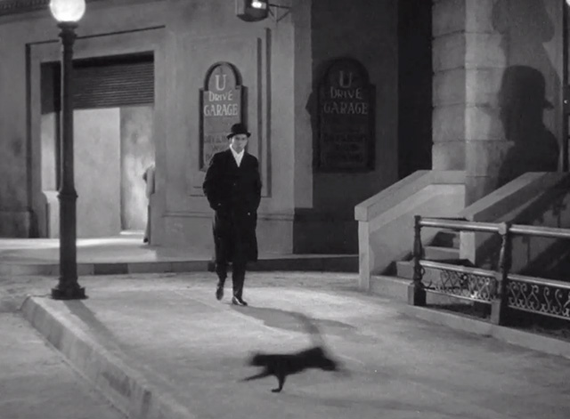 The Public Enemy - black cat crossing sidewalk in front of Putty Nose Murray Kinnell