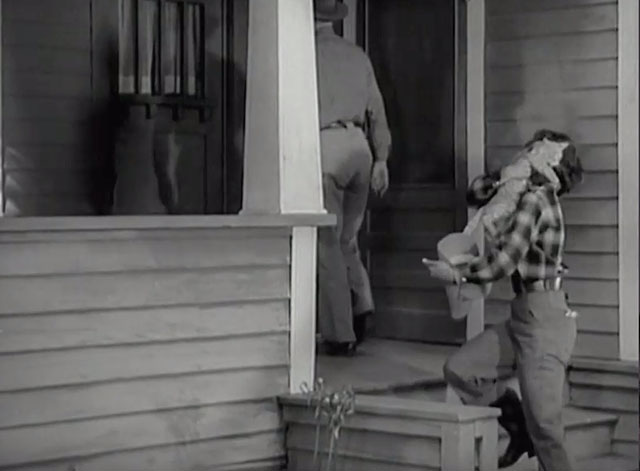 Racing Lady - Ruth Ann Dvorak picking up tabby cat as Tom Harry Carey enters house