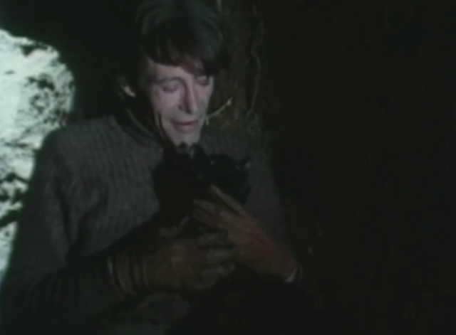 Rogue Male - Robert Hunter Peter O'Toole holding black cat Asmodeus in underground shelter