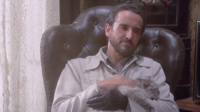 Scent of a Woman - Fausto Vittorio Gassman petting gray long-haired tabby cat Baron on lap