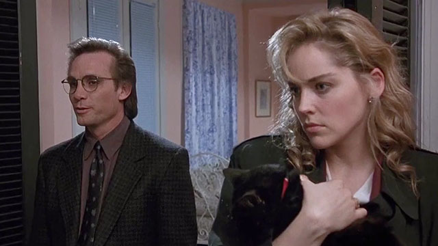 Scissors - black cat Midnight held by Angela Sharon Stone with Alex Steve Railsback