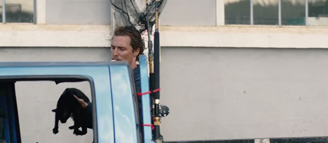 Serenity - Baker Dill Matthew McConaughey placing black cat in cab of truck