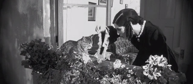 Shadow of the Vampire - Greta Schröder Catherine McCormack dangling ball in front of tabby cat in window