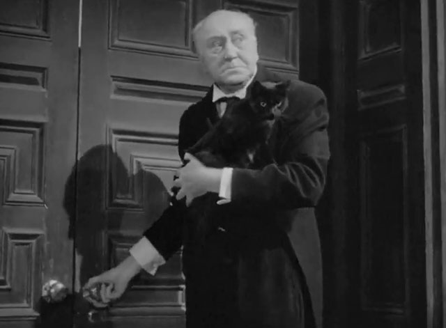 Sherlock Holmes Faces Death - Alfred Halliwell Hobbes holding black cat at library door