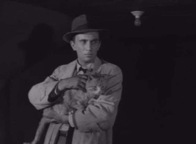 Short Cut to Hell - Kyle Robert Ivers holding dirty tabby cat Corky