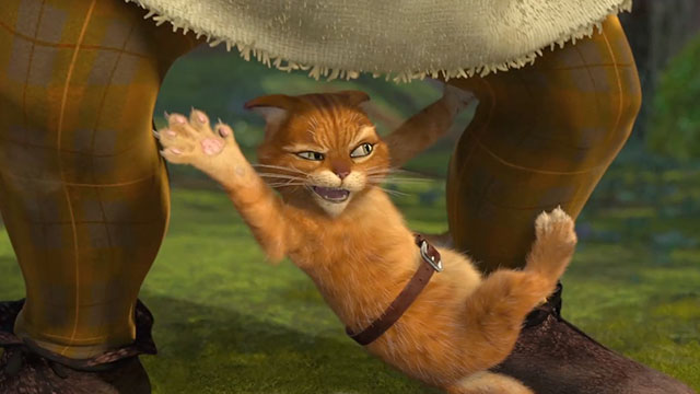 Shrek 2 - cartoon ginger tabby cat Puss in Boots attacking Shrek's legs