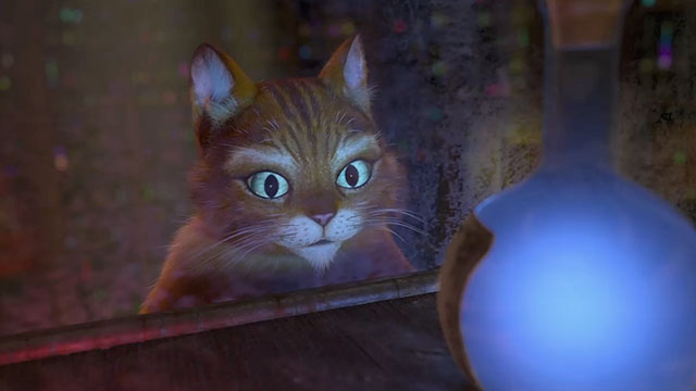 Shrek 2 - cartoon ginger tabby cat Puss in Boots looking at glowing bottle