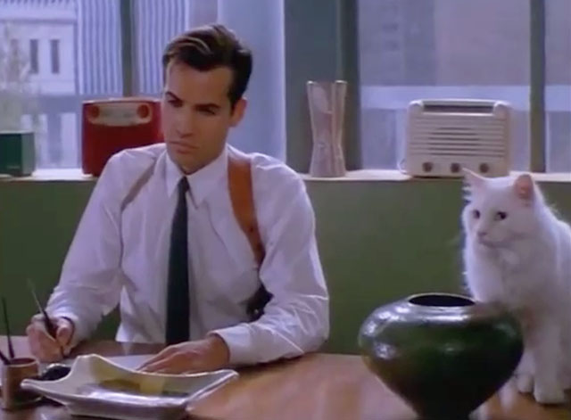 The Silence of the Hams - Jo Dee Fostar Billy Zane sitting at desk with longhair white cat