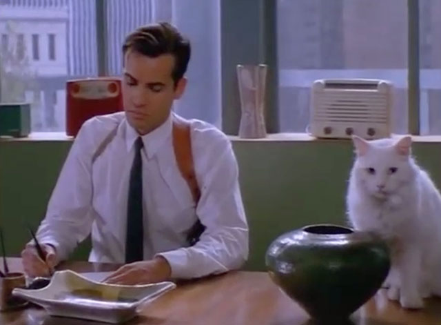 The Silence of the Hams - Jo Dee Fostar Billy Zane sitting at desk with longhair white cat