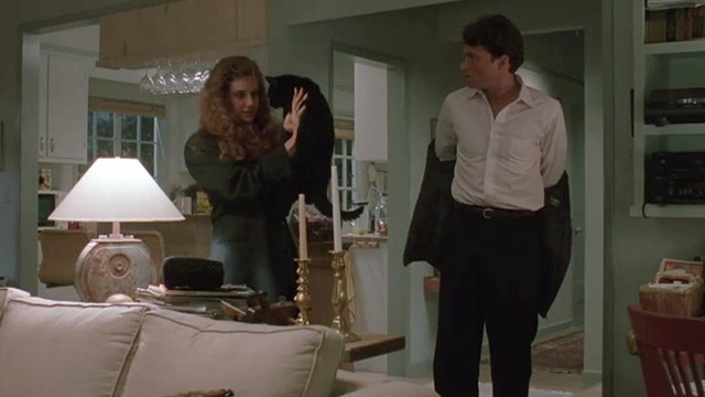 Spellbinder - Jeff Tim Daly with Miranda Kelly Preston holding up black cat Davey