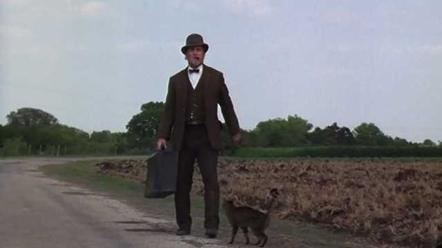 The Stars Fell on Henrietta - Mr. Cox Robert Duvall walking down road with brown tabby cat Matilda