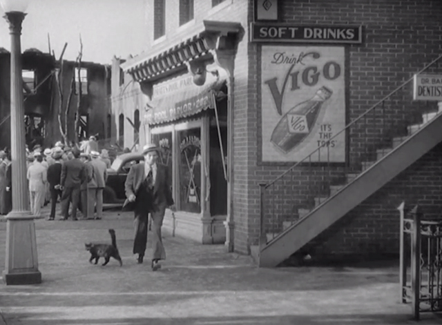 The Talk of the Town - Jan Pulaski Leonid Kinskey on street with tortoiseshell cat passing by