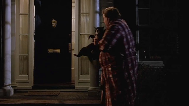 Uncle Buck - John Candy wrestling outside house at night with tuxedo cat