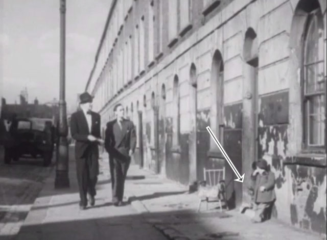 Vengeance is Mine - Charles Heywood Valentine Dyall and Stacy Sam Kydd walking down street toward child and tabby cat in doorway