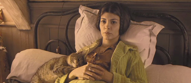 A Very Long Engagement - tabby cat on bed cuddling with Mathilde Audrey Tautou