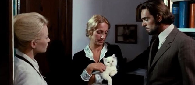 What Have You Done to Solange? - Janet's mother holding longhair white kitten with Henry Fabio Testi and Herta Karin Baal